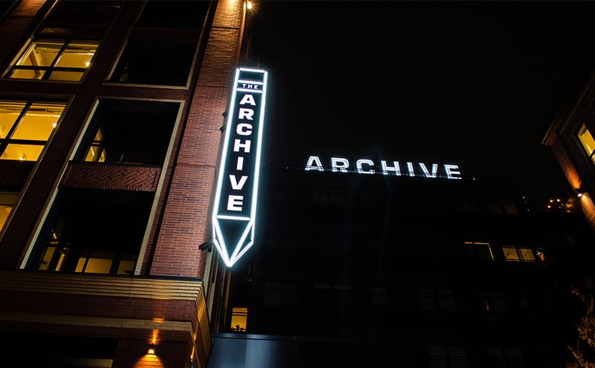 The Archive residential building signage outside of building