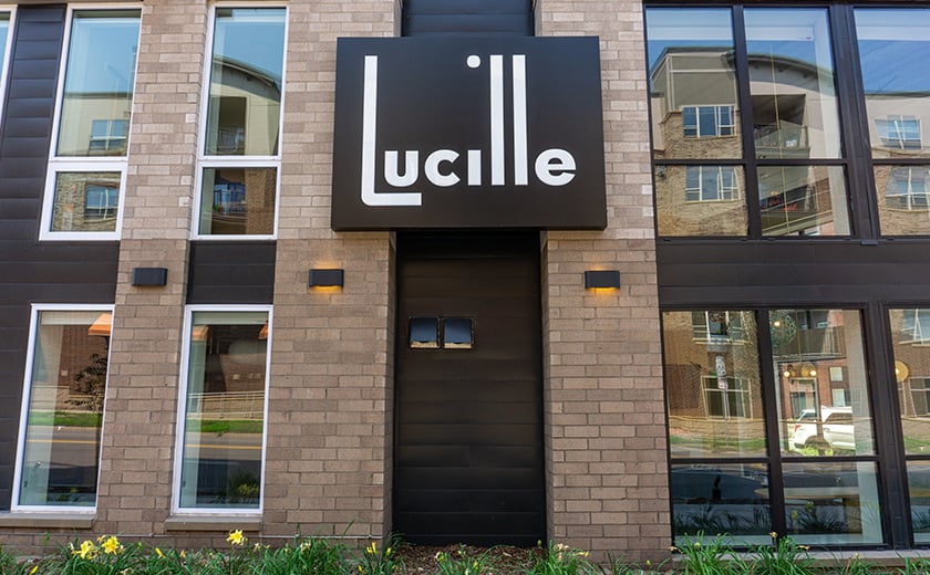 Lucille cabinet sign on exterior of a building 