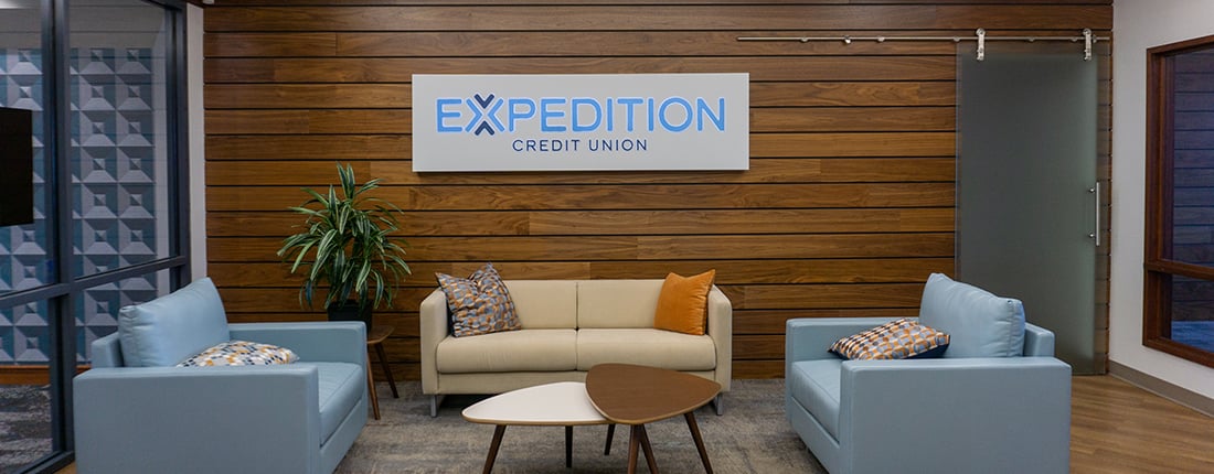 Expedition Credit Union interior sign on wall